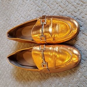 Metallic orange loafers